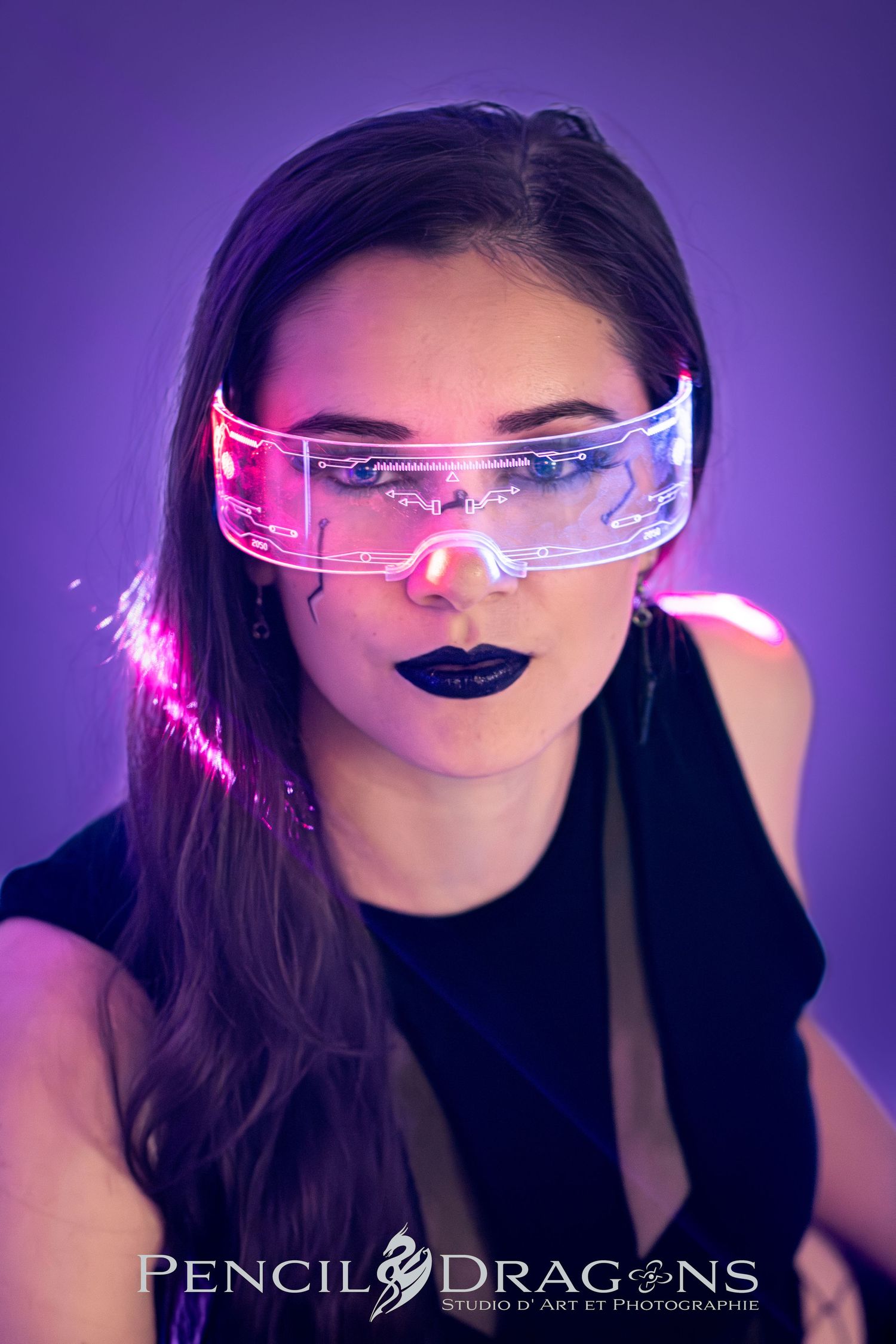 Futuristic portrait series featuring illuminated visor glasses in pink and purple lighting.