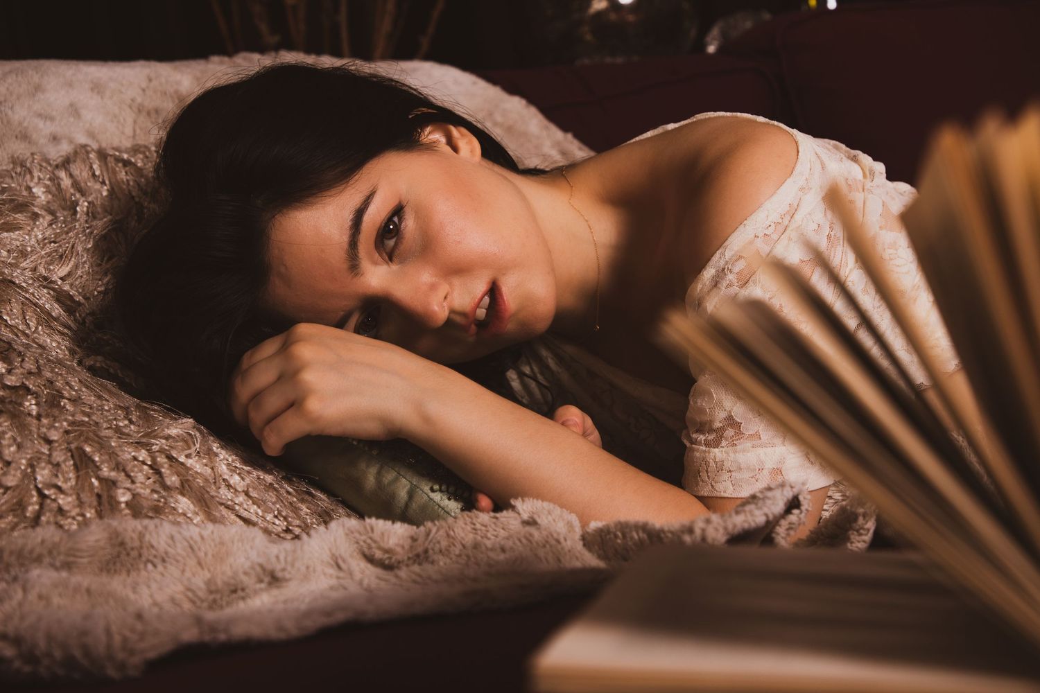 Romantic boudoir series featuring soft lighting and delicate lace details.