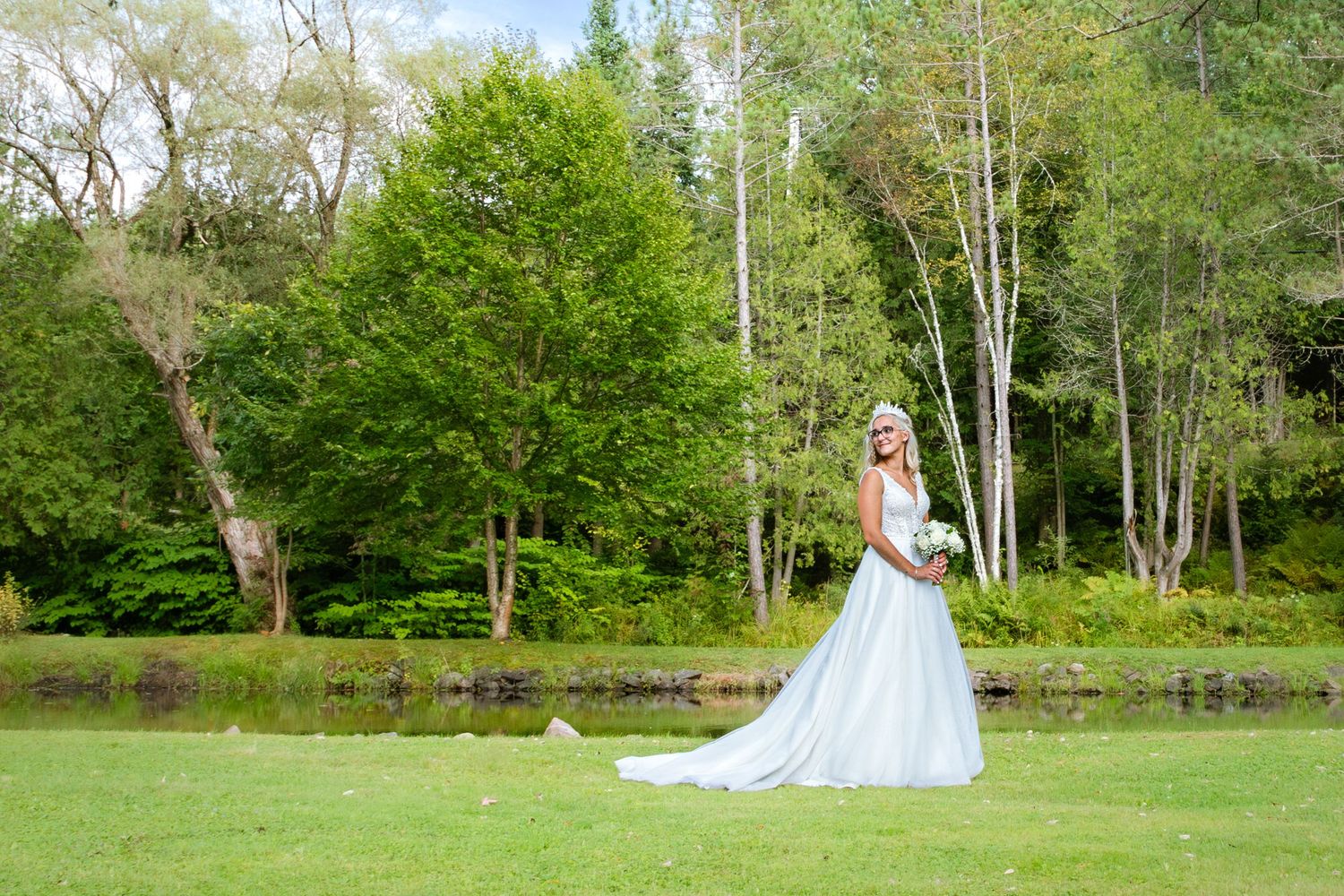 Outdoor wedding photography sequence showing bridal party on lush green grounds.