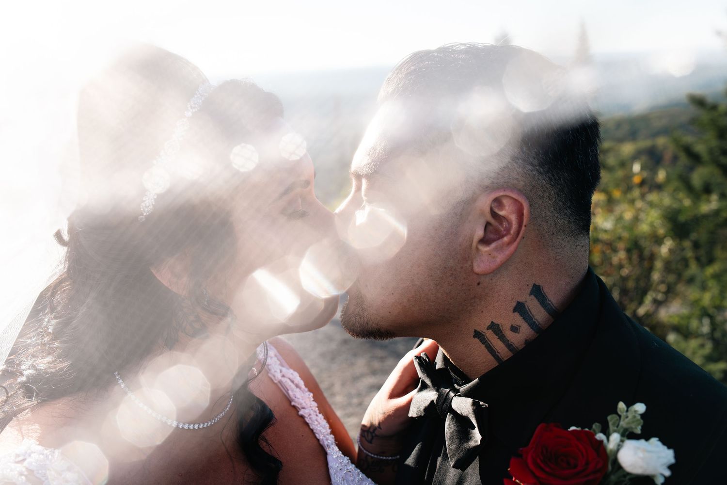 Romantic couple shares intimate moments in a series of outdoor portraits with soft lighting.