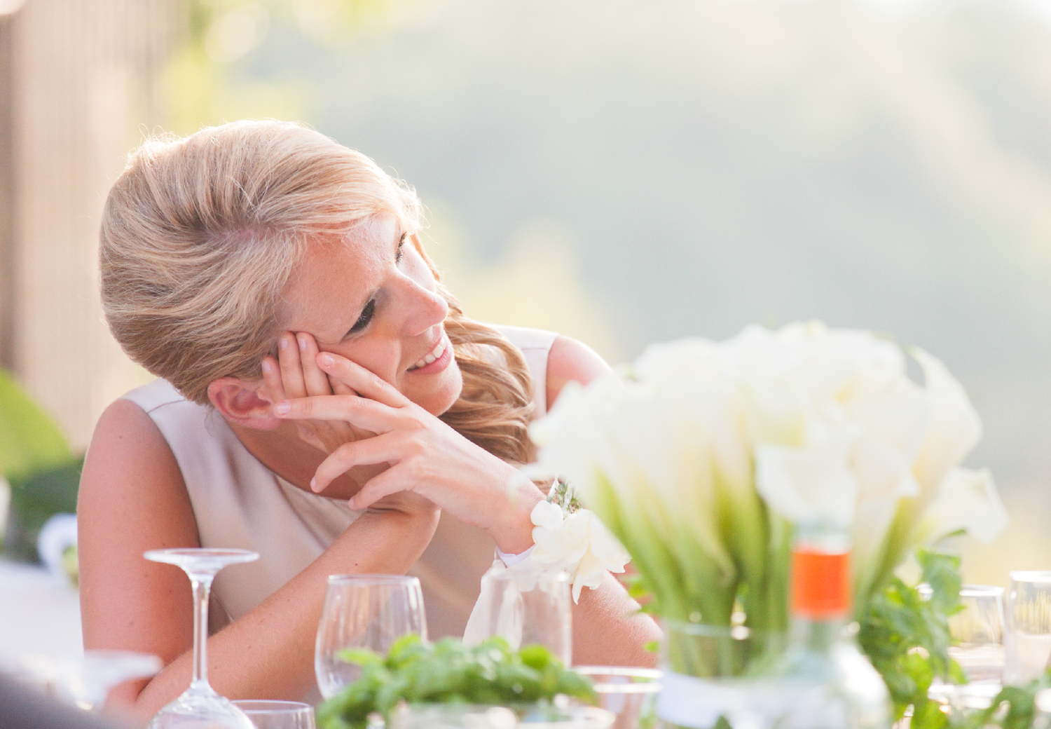 Emotional candid moments captured during wedding reception speeches.