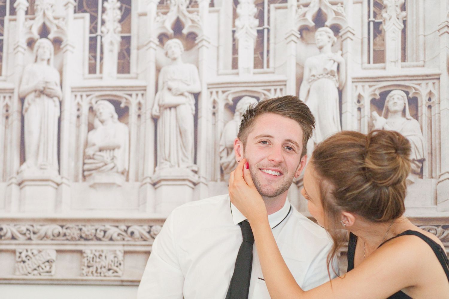 Guests sharing joyful moments at an elegant indoor celebration.