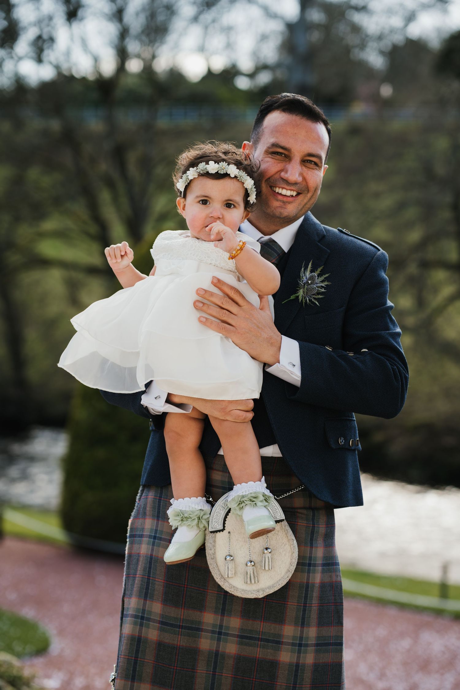 A series of joyful moments at a wedding celebration featuring traditional Scottish attire and formal wear.