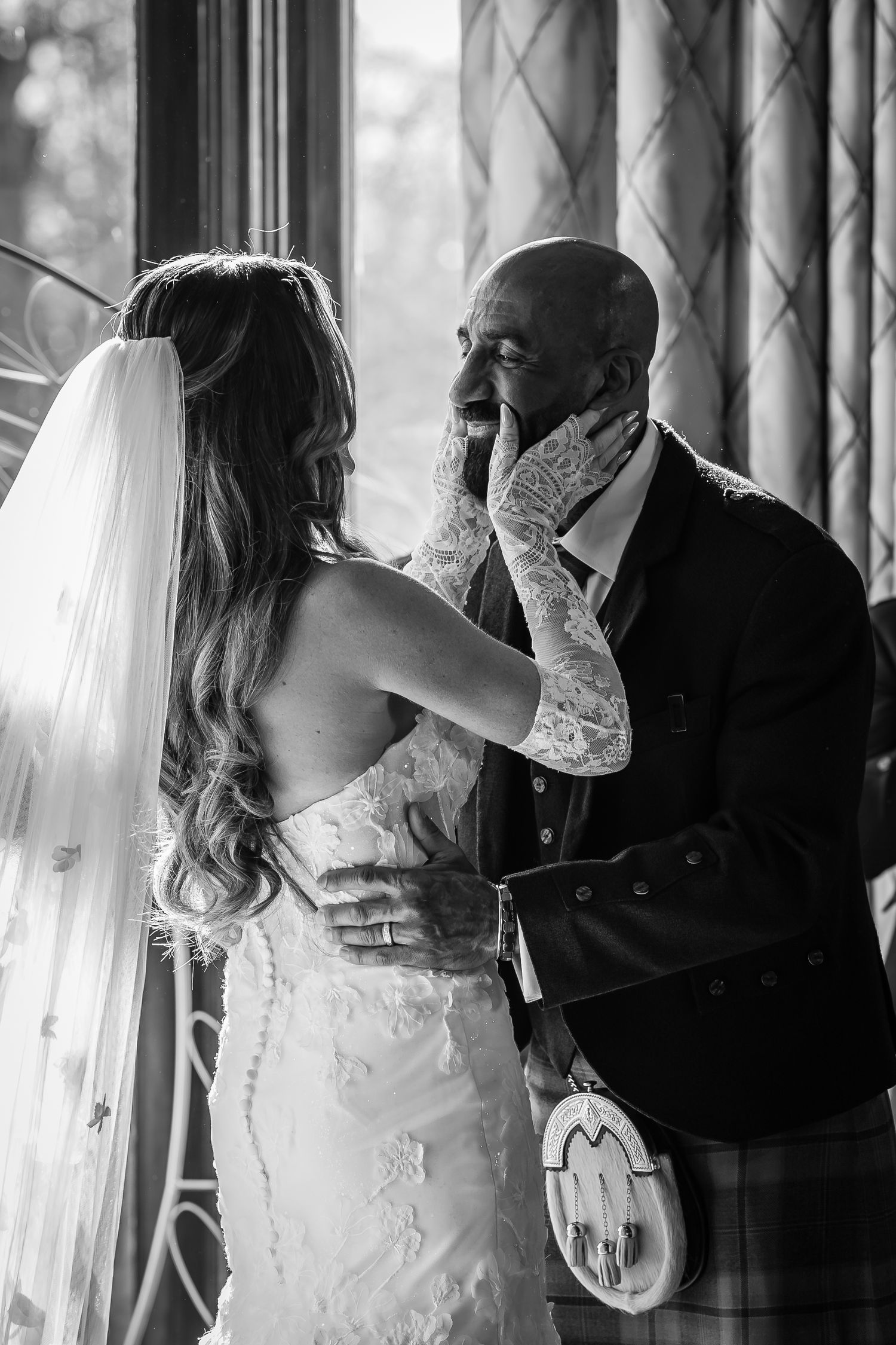 A black and white photo series showing intimate dance moments between a bride and groom at their wedding reception.