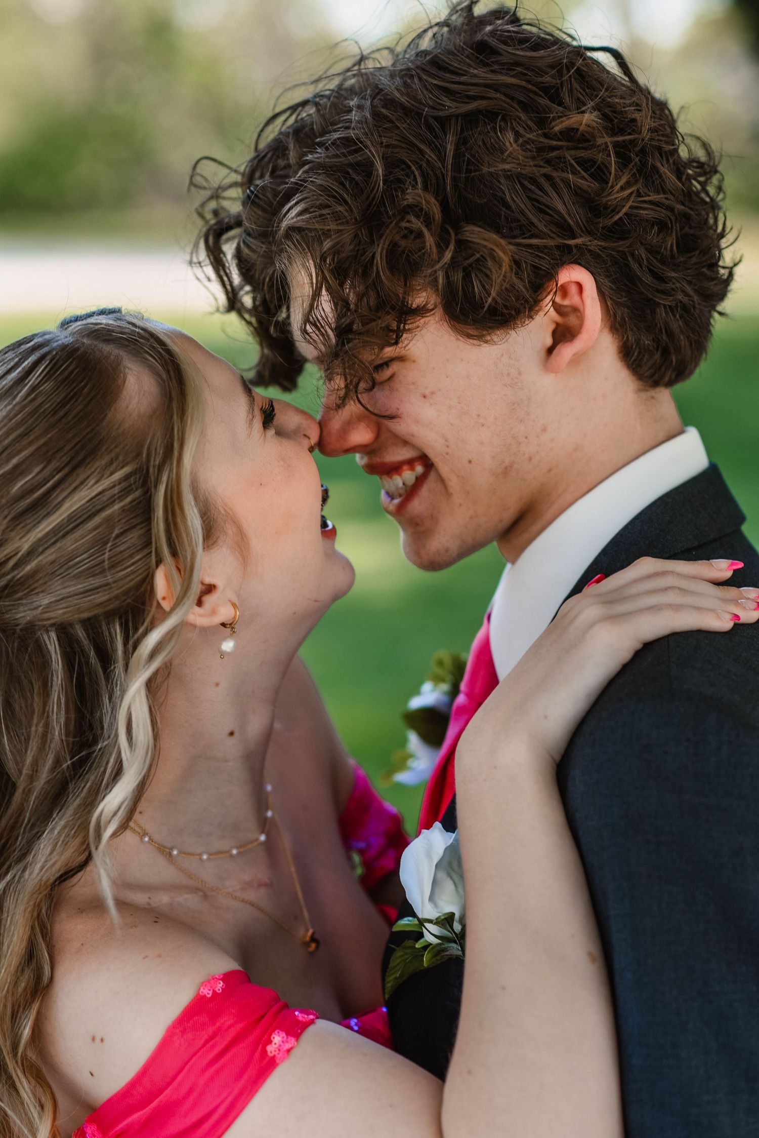Close-up sequence of romantic moments between couple in formal attire.