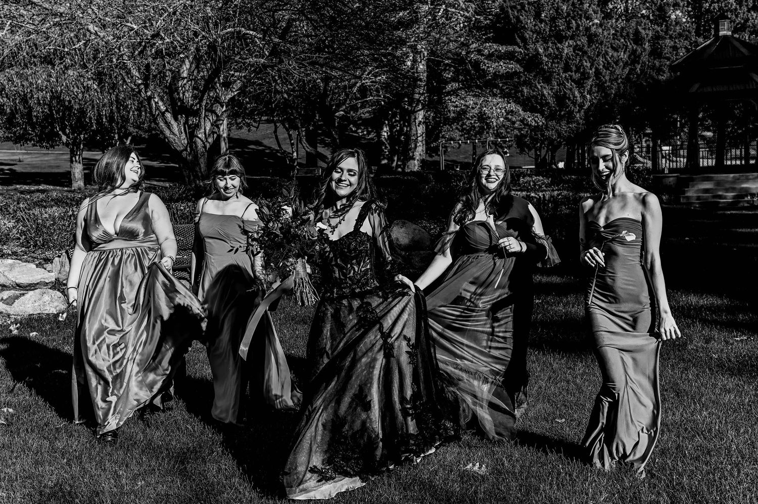 A series of candid outdoor photos showing people sitting and laughing together on grass.
