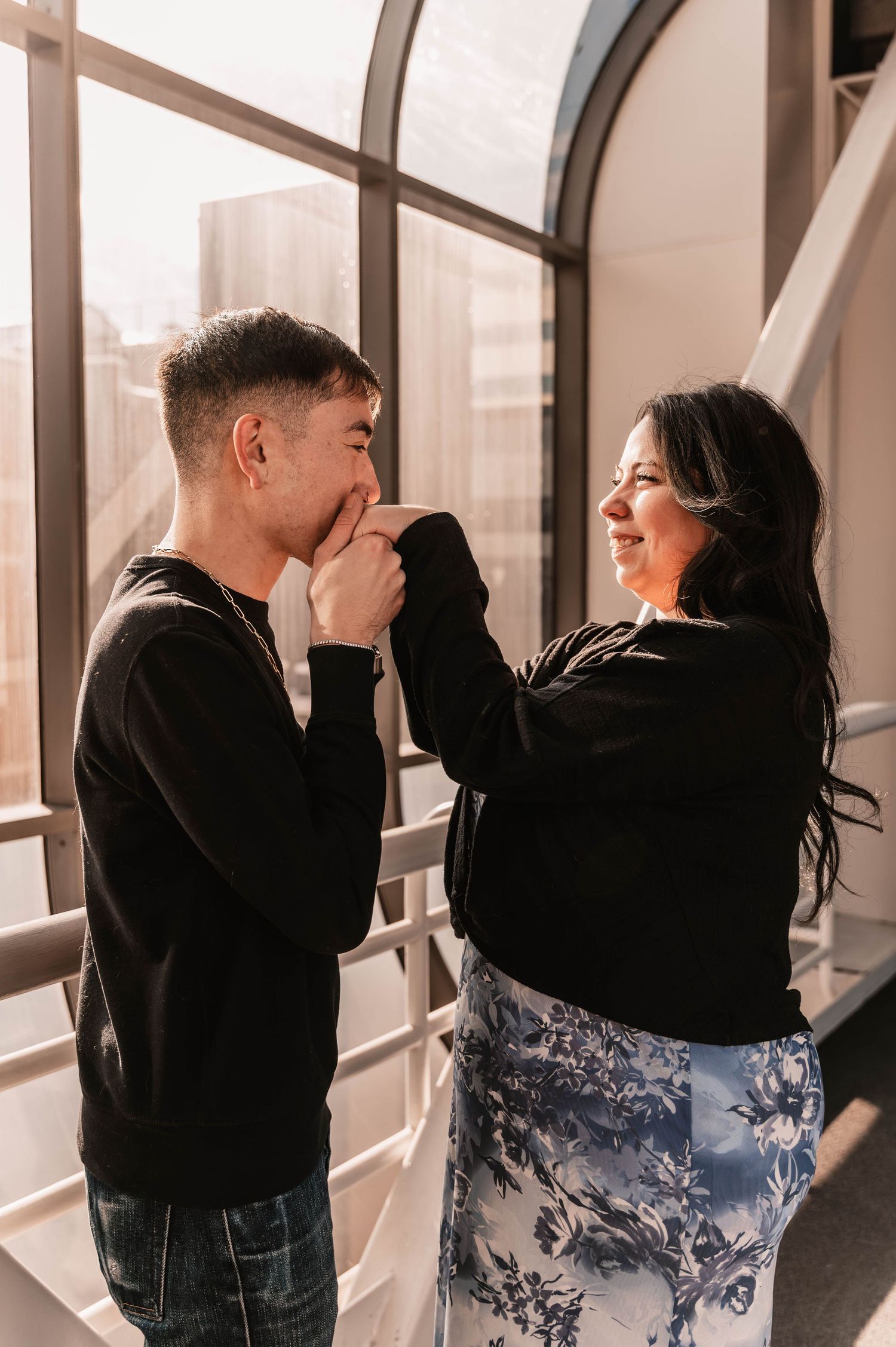 Engagement photo sequence showing romantic moments in a sunlit indoor setting.