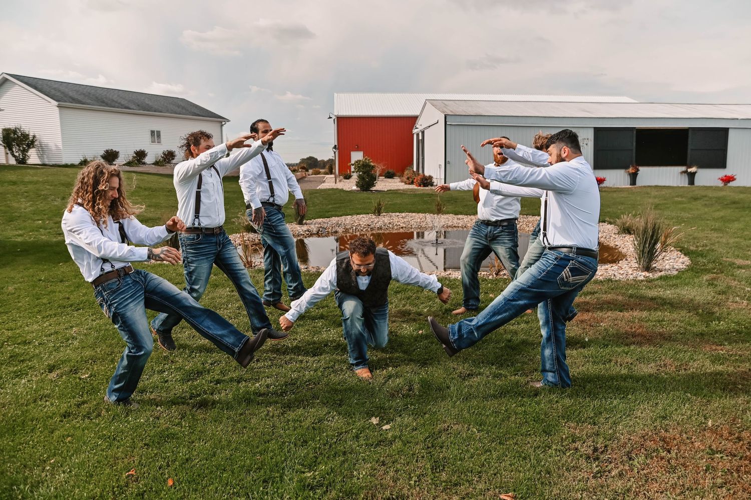 Group photo sequence showing people jumping and posing outdoors near a barn.