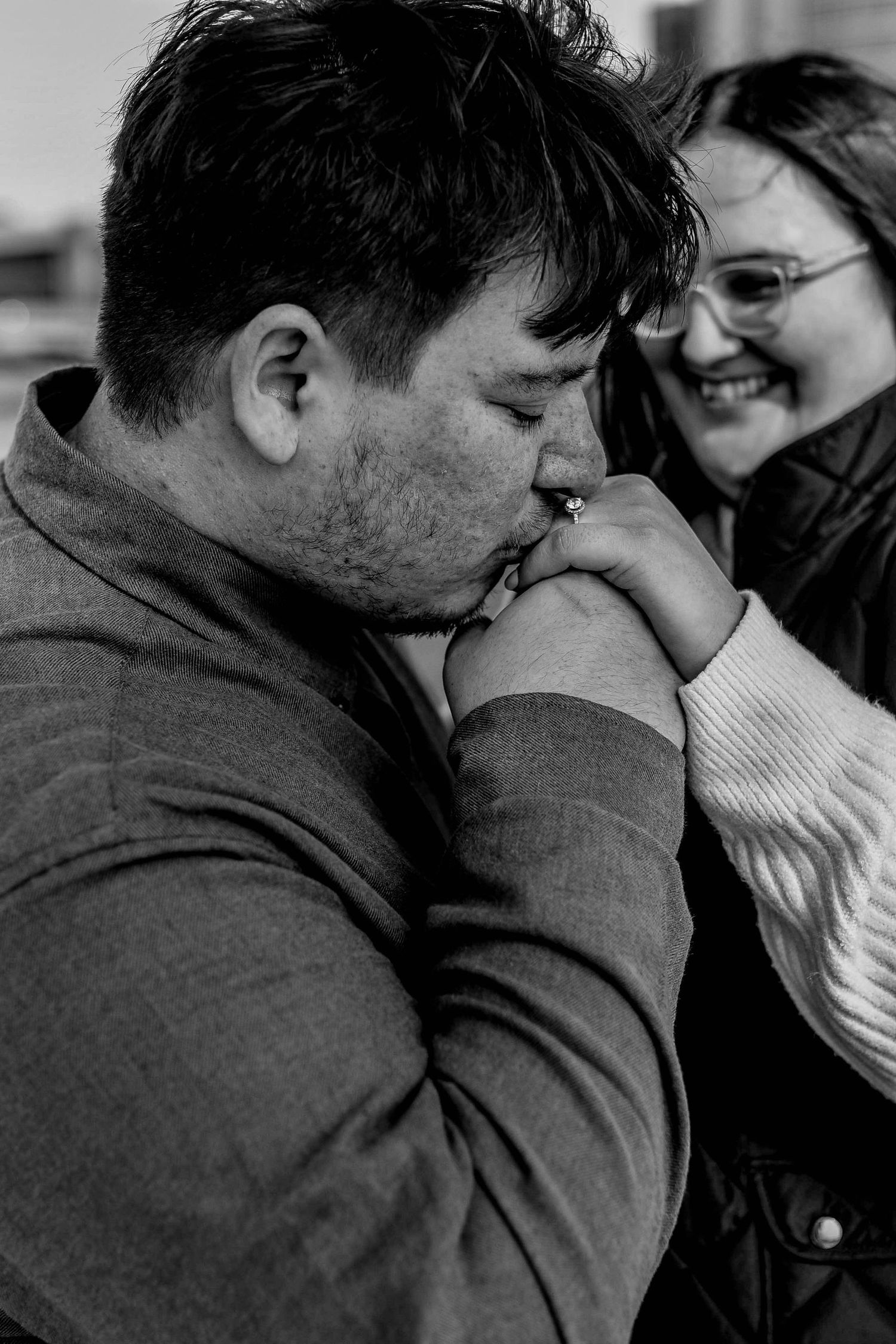 Black and white sequence showing an intimate moment between two people.