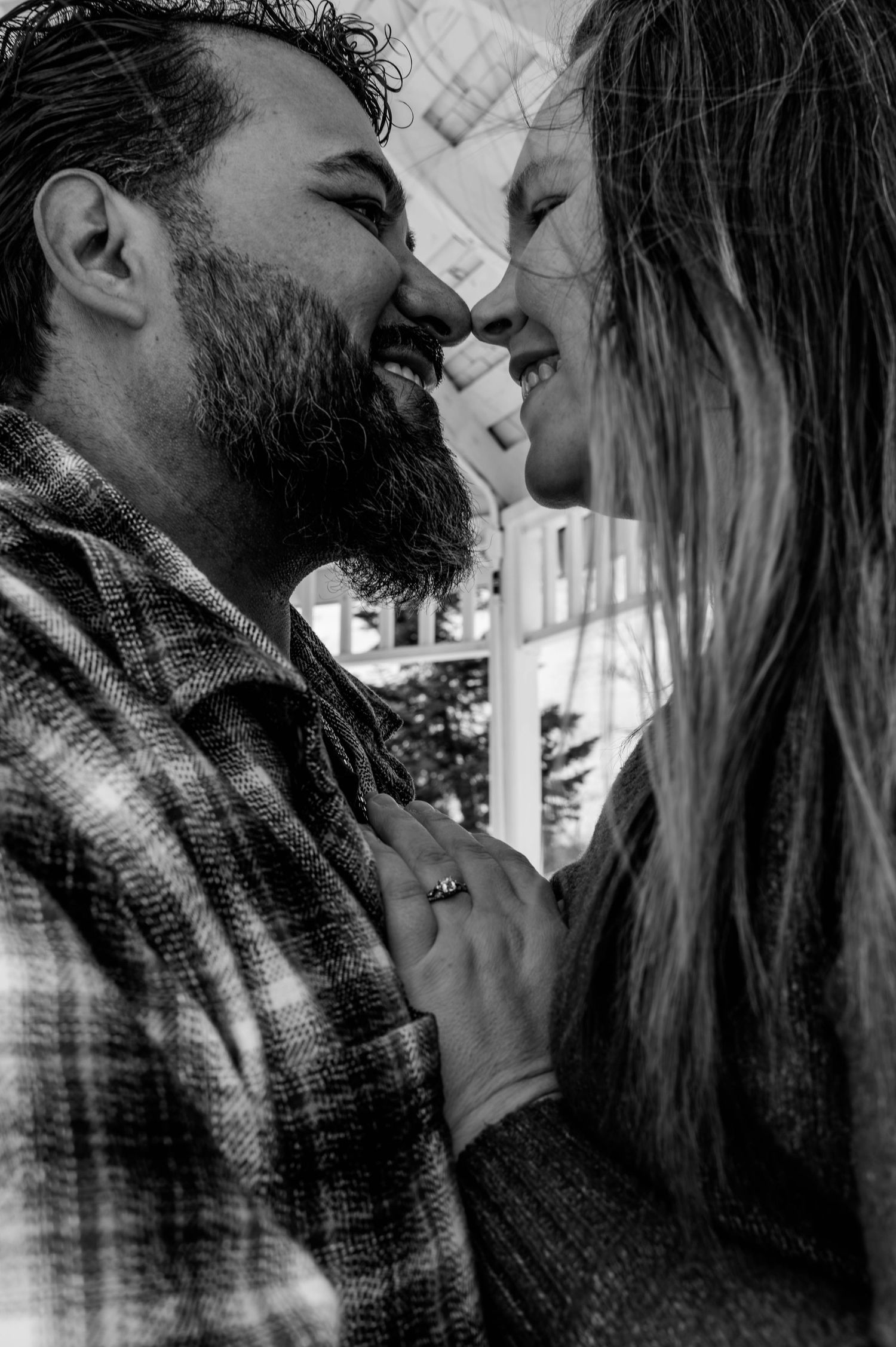 Black and white intimate close-up sequence showing tender moments.