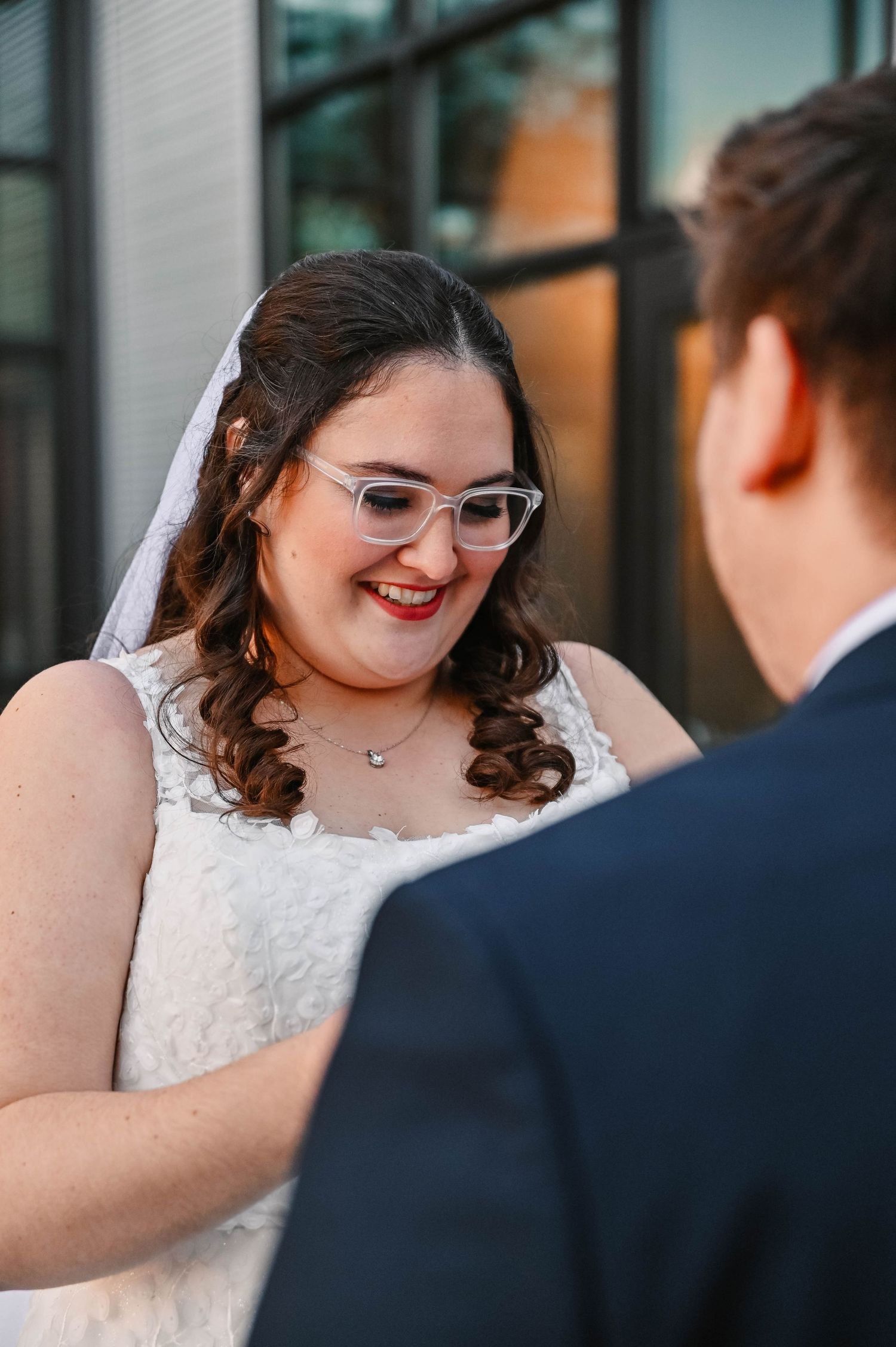 An intimate moment between newlyweds during their wedding photoshoot.
