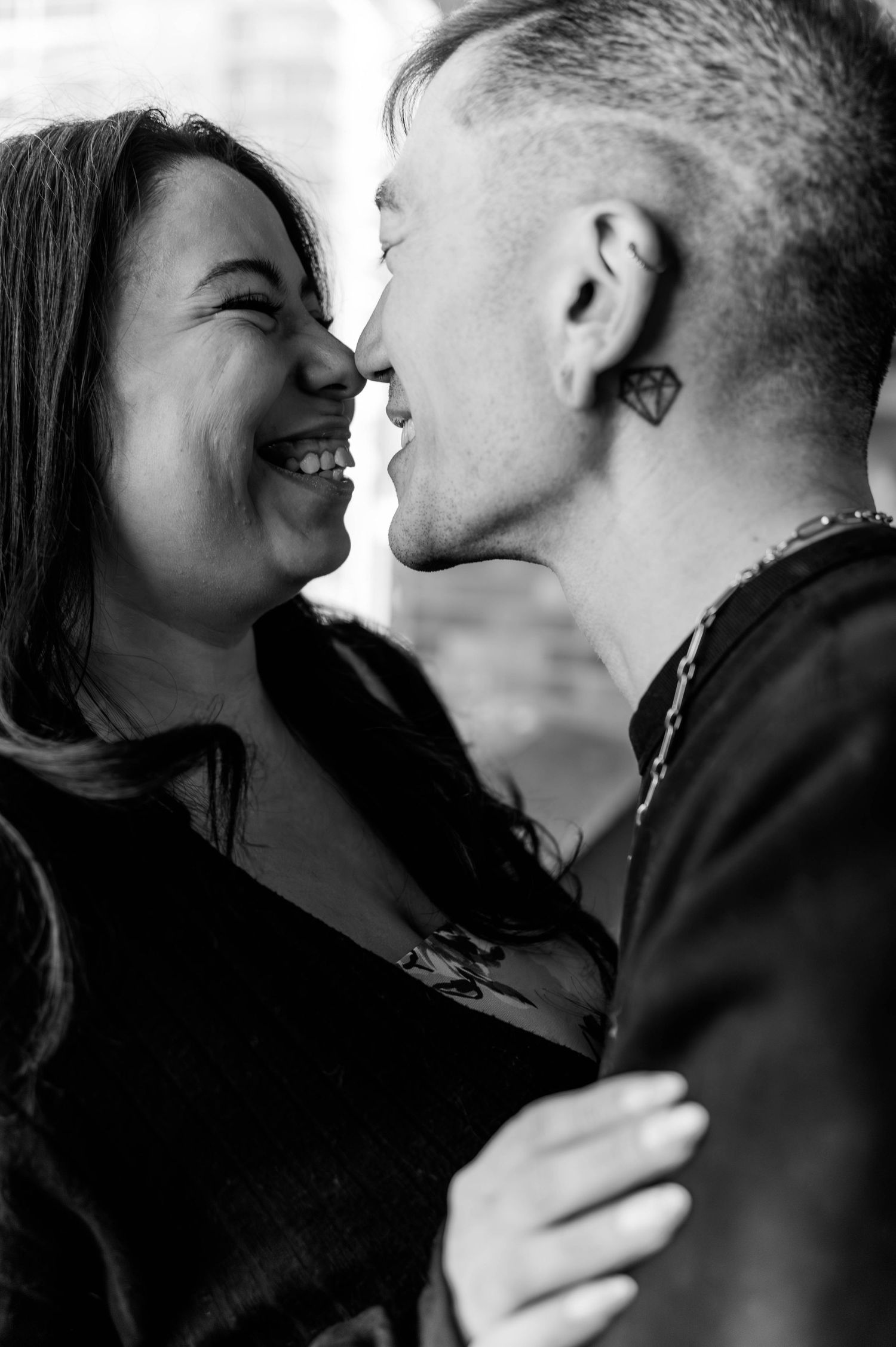 Black and white sequence of intimate close-up moments between a couple.