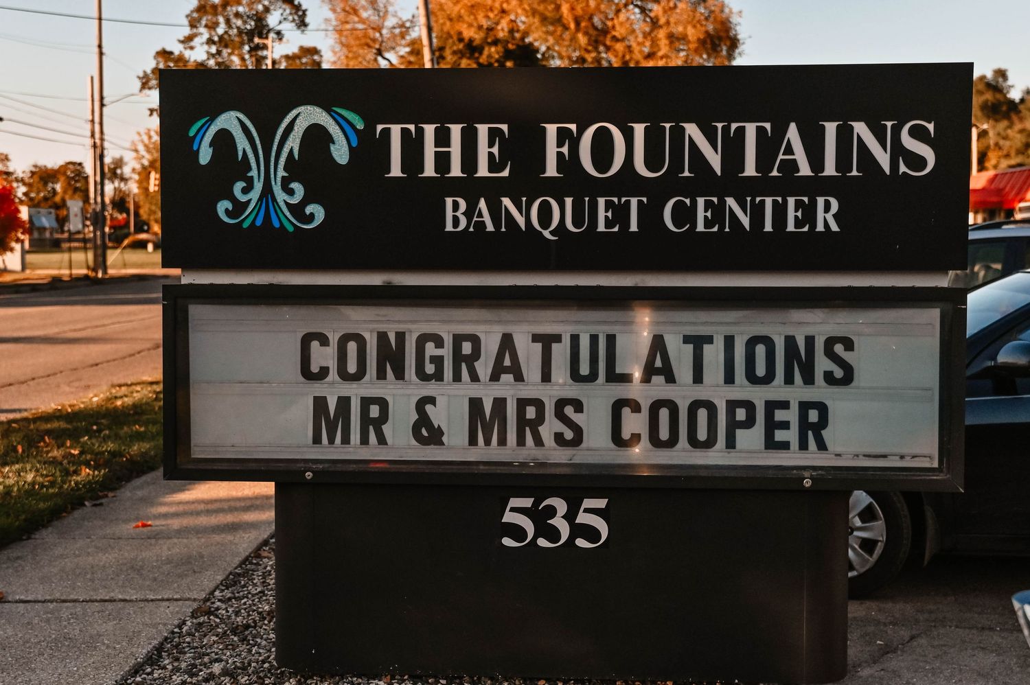 The Fountains Banquet Center sign displaying congratulations message.
