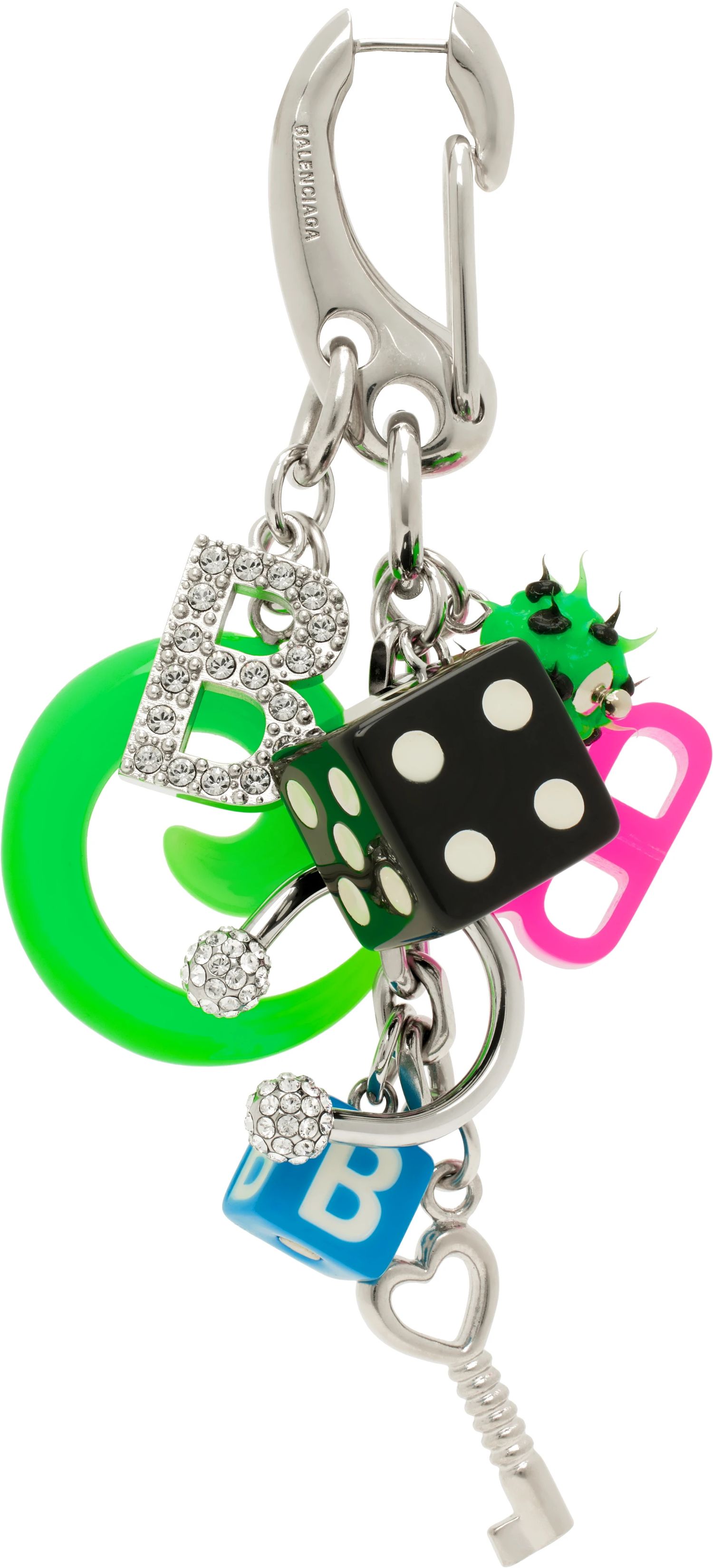 A multi-coloured trompe-l'oeil Balenciaga earring that resembles a keyring.