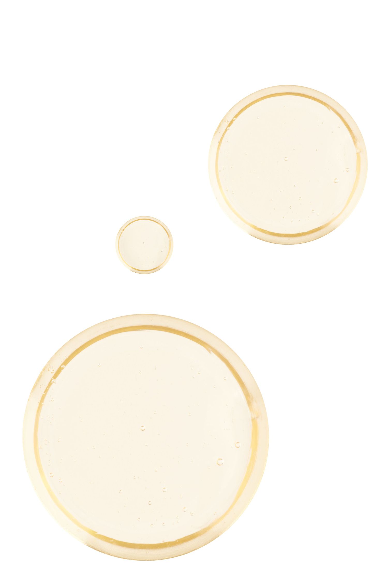 A product shot to show texture of a translucent orange soap.