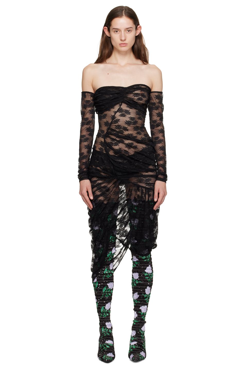 Model Ruby Evers wears a  sheer black lace gown and floral boots by designer Yuhan Wang.