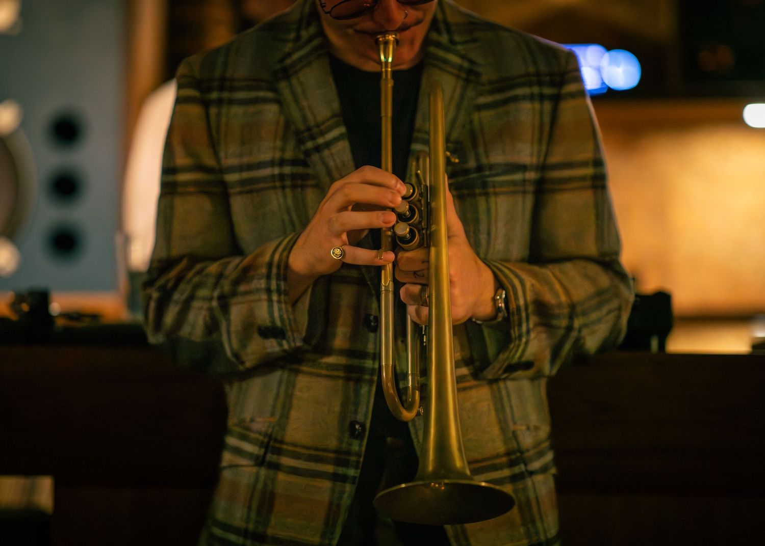 Trumpet players hands live in Montreal Jazz club by Eva Z