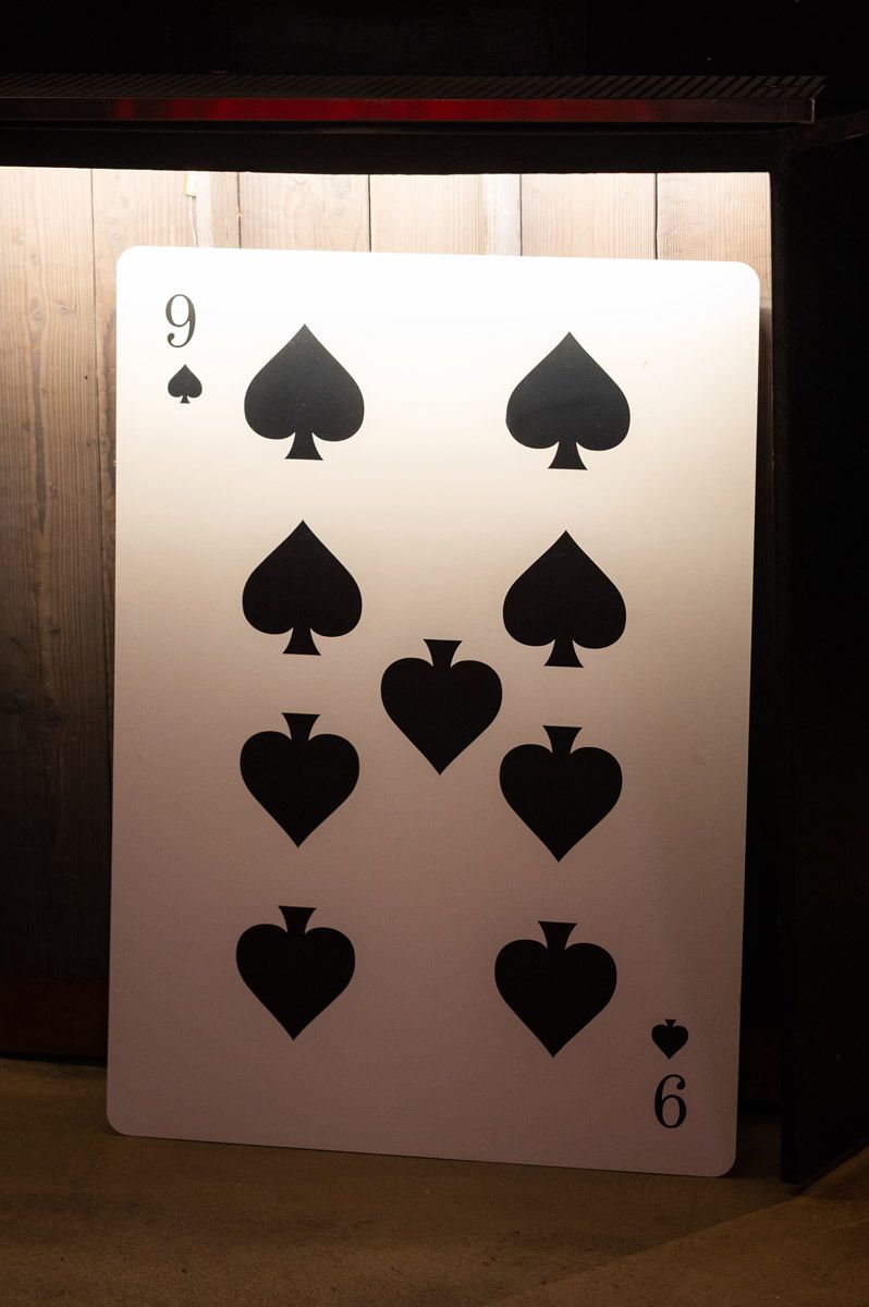 Oversized playing card display at the Conresta Winter Party