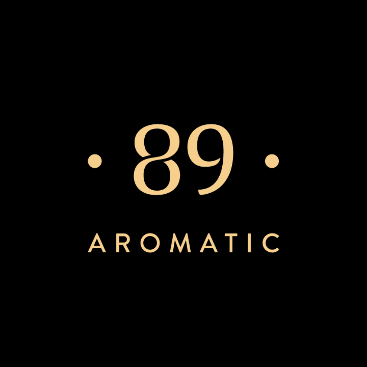 Black logo with the number 89 in golden serif type framed by two dots above the word AROMATIC in gold capital letters.