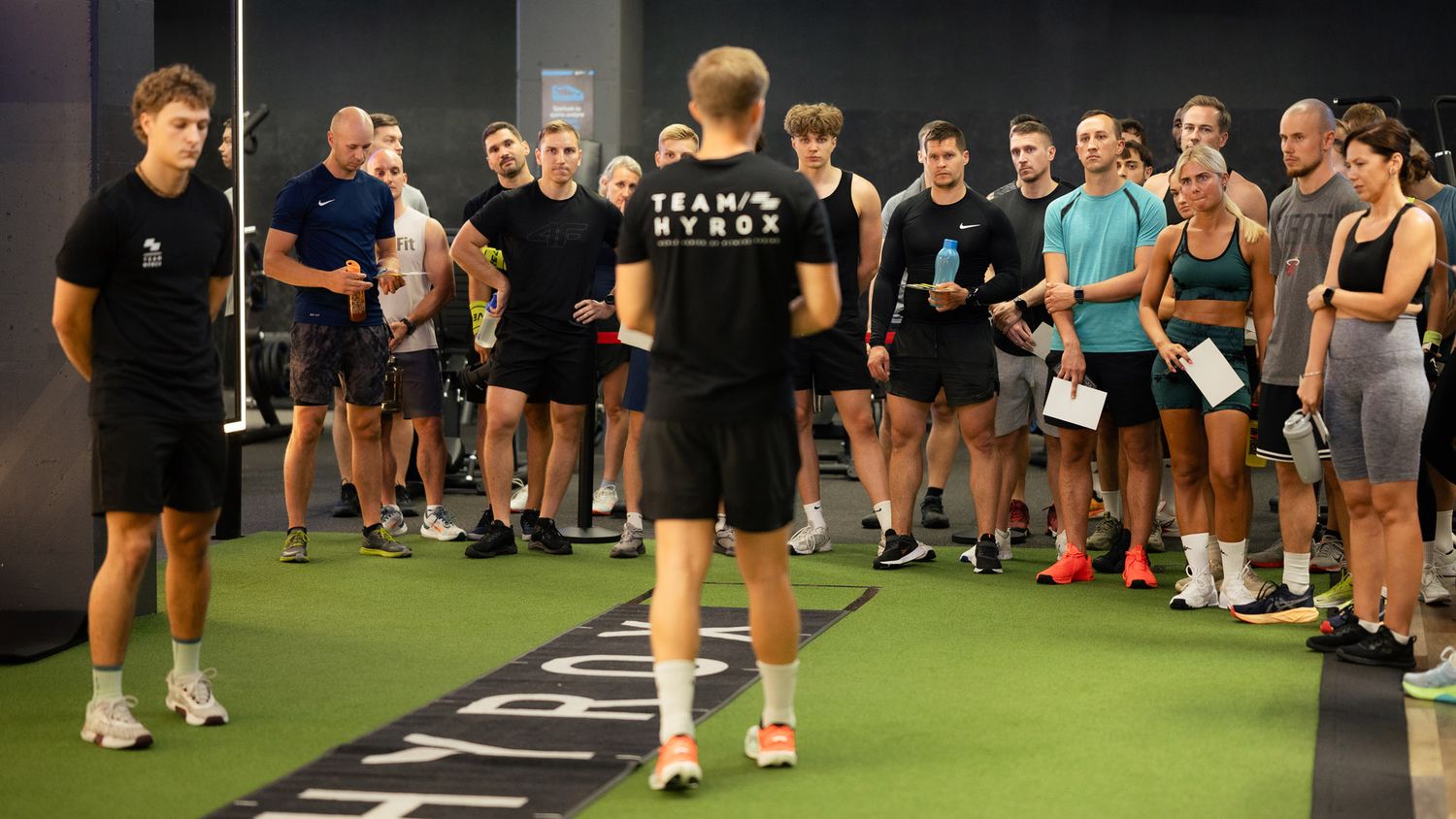 HYROX athletes preparing for a fitness competition at Gym+