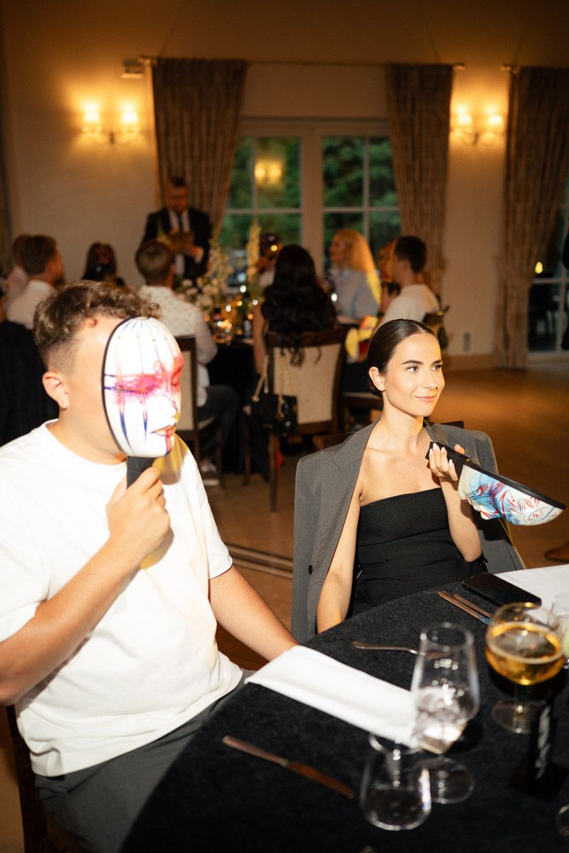 Guests sitting together during the Mafia game