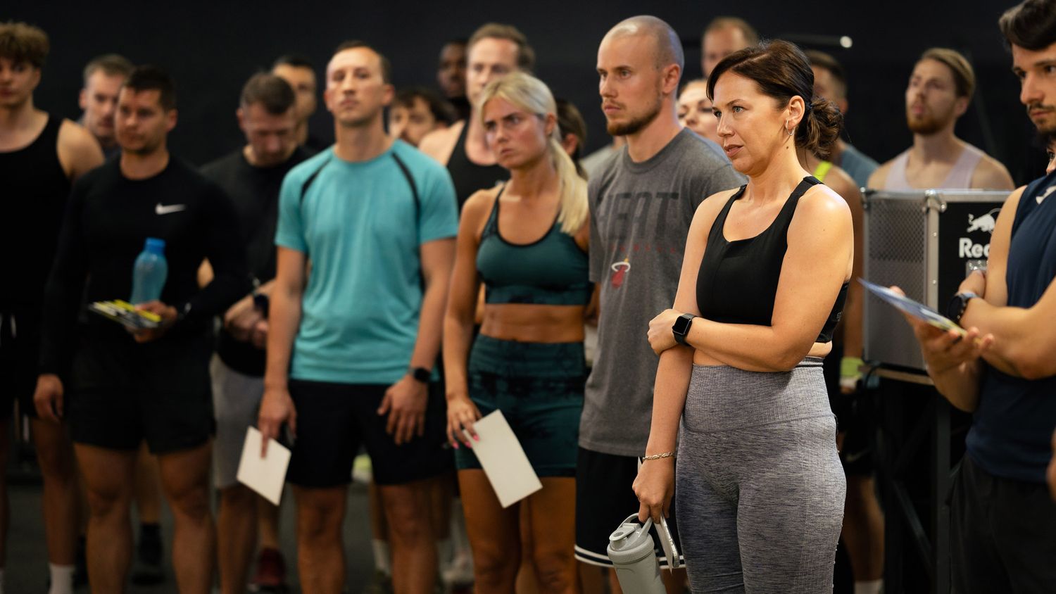 People participating in a HYROX fitness event at Gym+