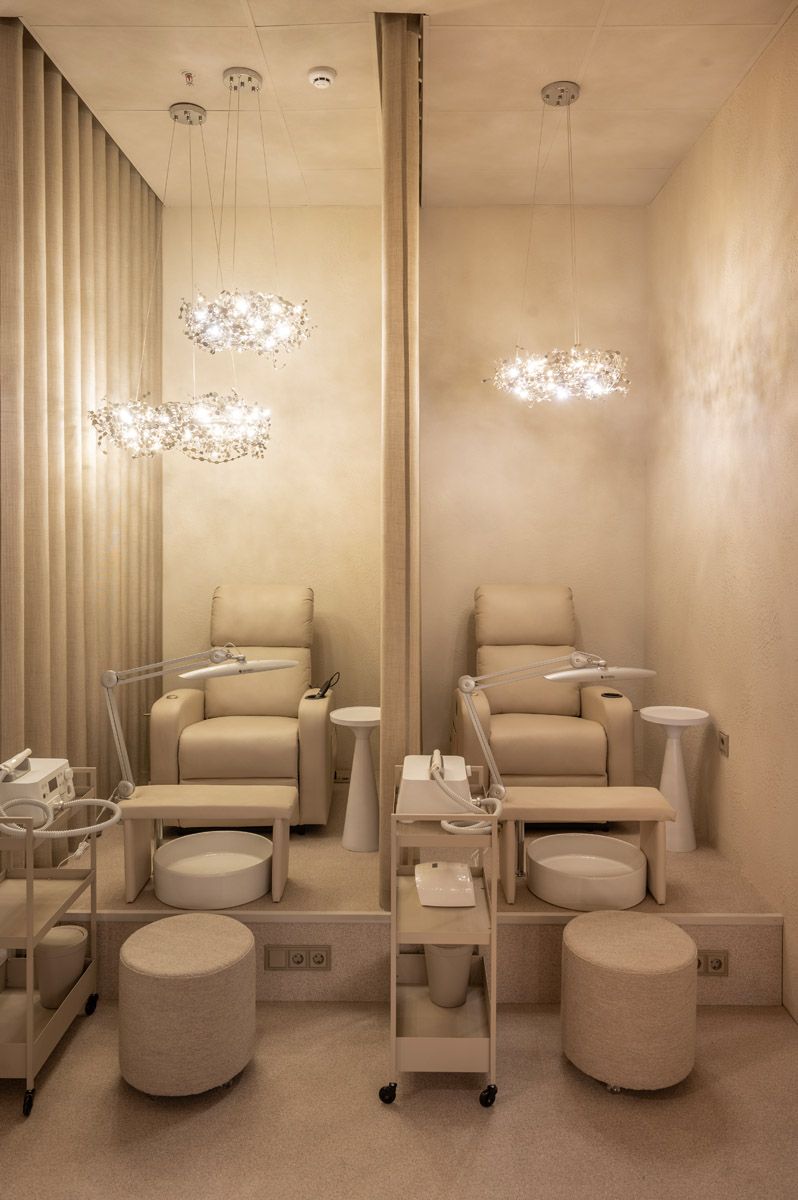 Beauty salon interior with modern furniture and lighting