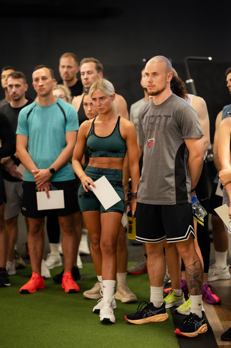 Group of athletes gathered during a HYROX event