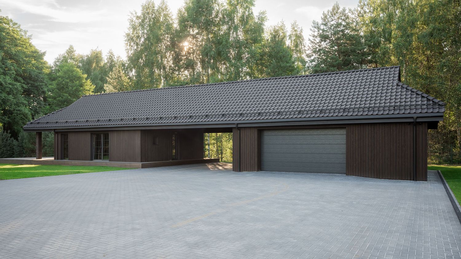 Contemporary wood-clad house and driveway in Trakai District