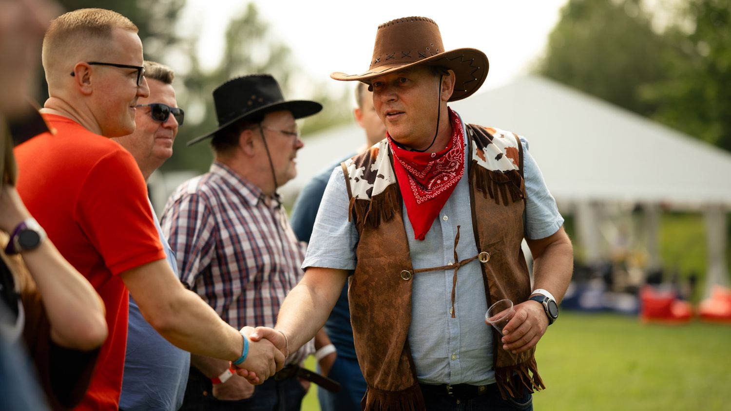 Employee wearing a cowboy hat at the Bagfactory event