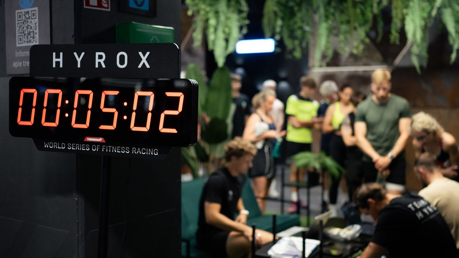 Athletes preparing for a HYROX workout challenge