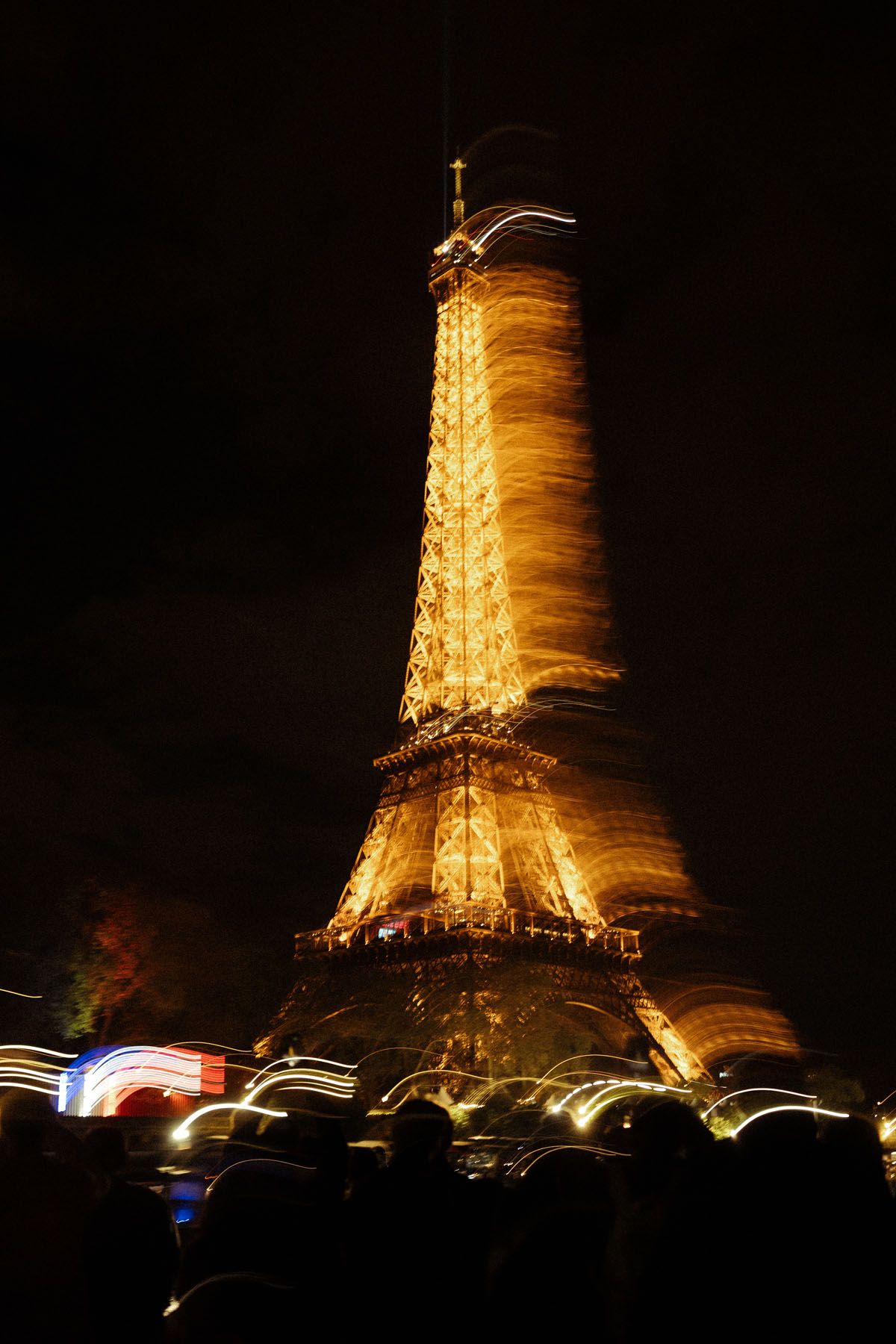 Eiffel Tower illuminated at night in Paris, France