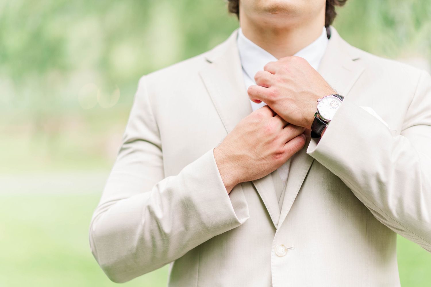 Groom getting ready at Whispering Hollow Estates in Pleasantville, Pennsylvania