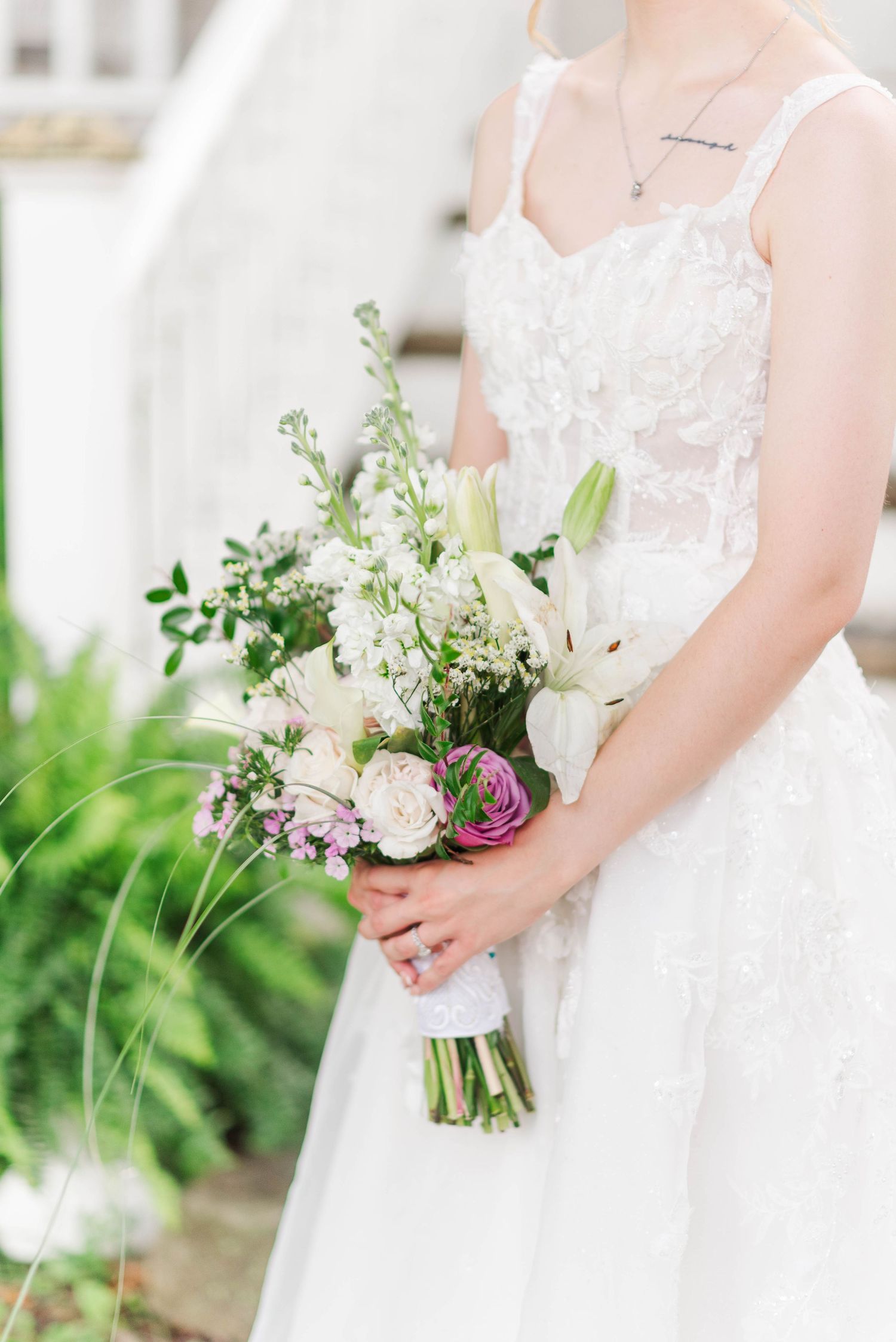 Bride holding bouquet at Joiner Farms in Northern Cambria, Pennsylvania