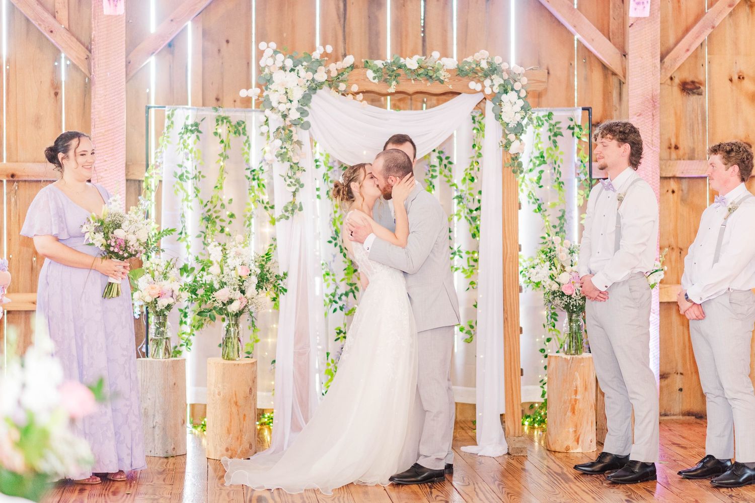 First kiss as husband and wife at Joiner Farms in Northern Cambria, Pennsylvania