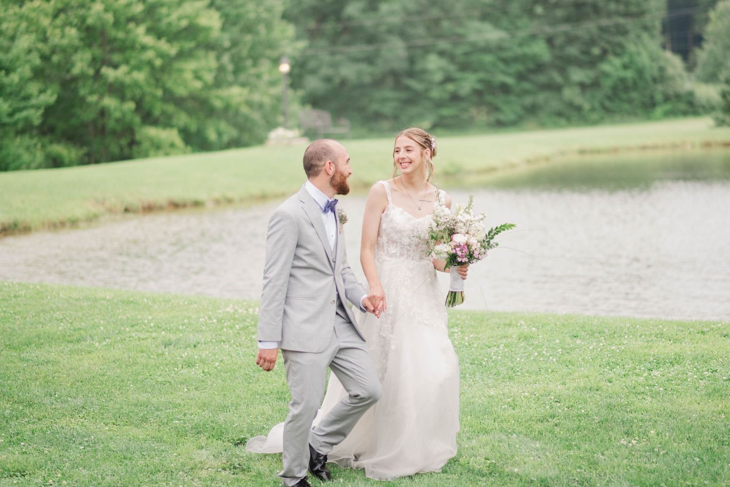 Couple walking hand in hand at Joiner Farms in Northern Cambria, Pennsylvania