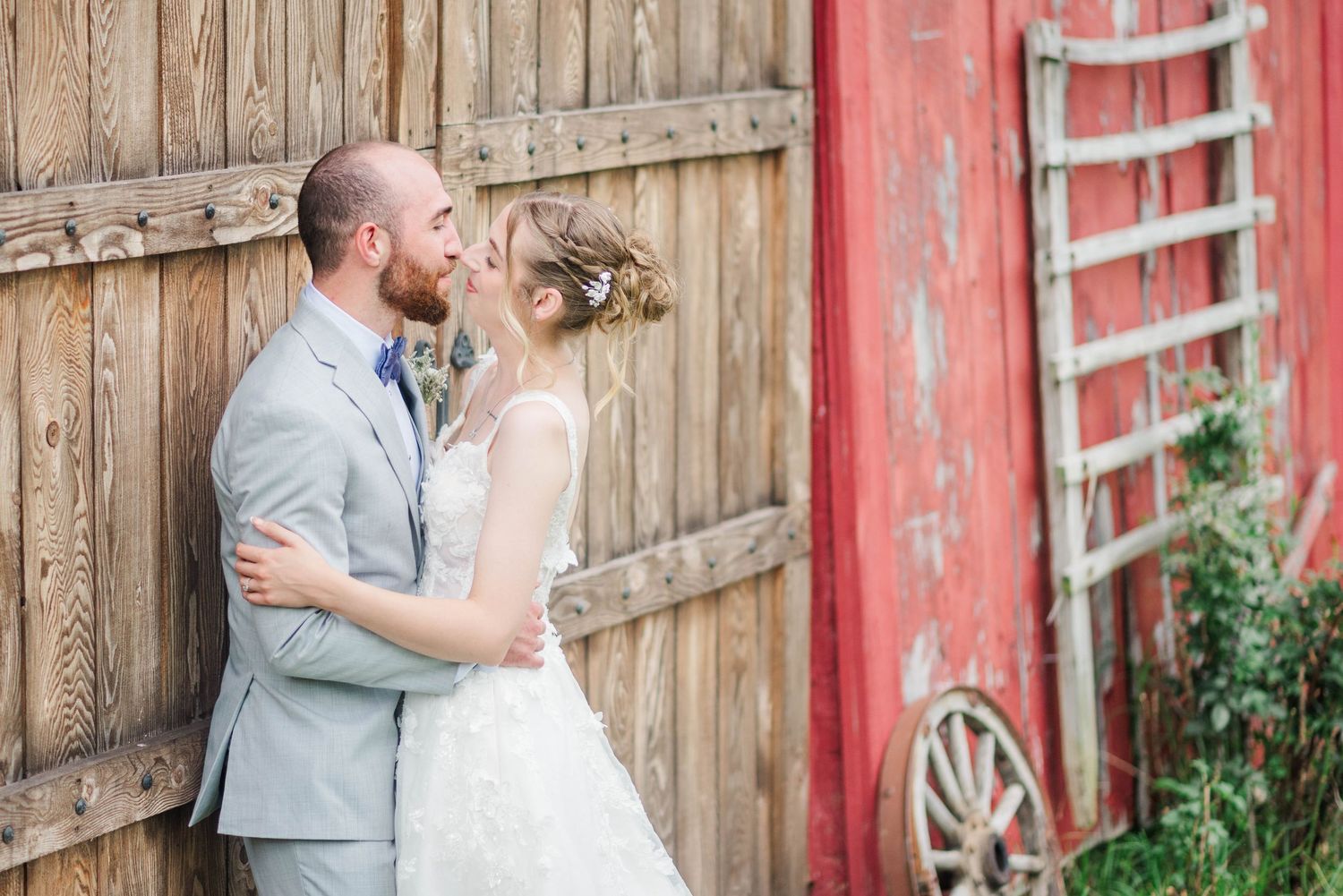 Bride and groom in front of the barn at Joiner Farms in Northern Cambria, Pennsylvania
