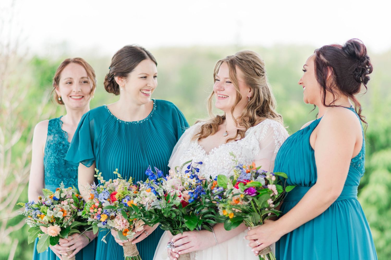 Bridal party laughing at the Roost in Mahaffey, Pennsylvania