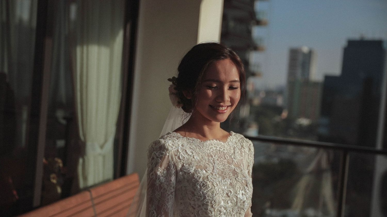 bride smiling captured by Singapore wedding videographer