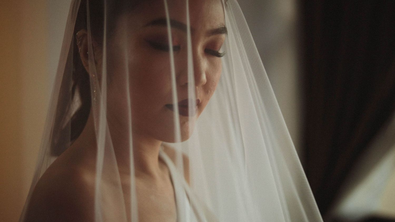 Bride in gown captured by Singapore wedding videographer