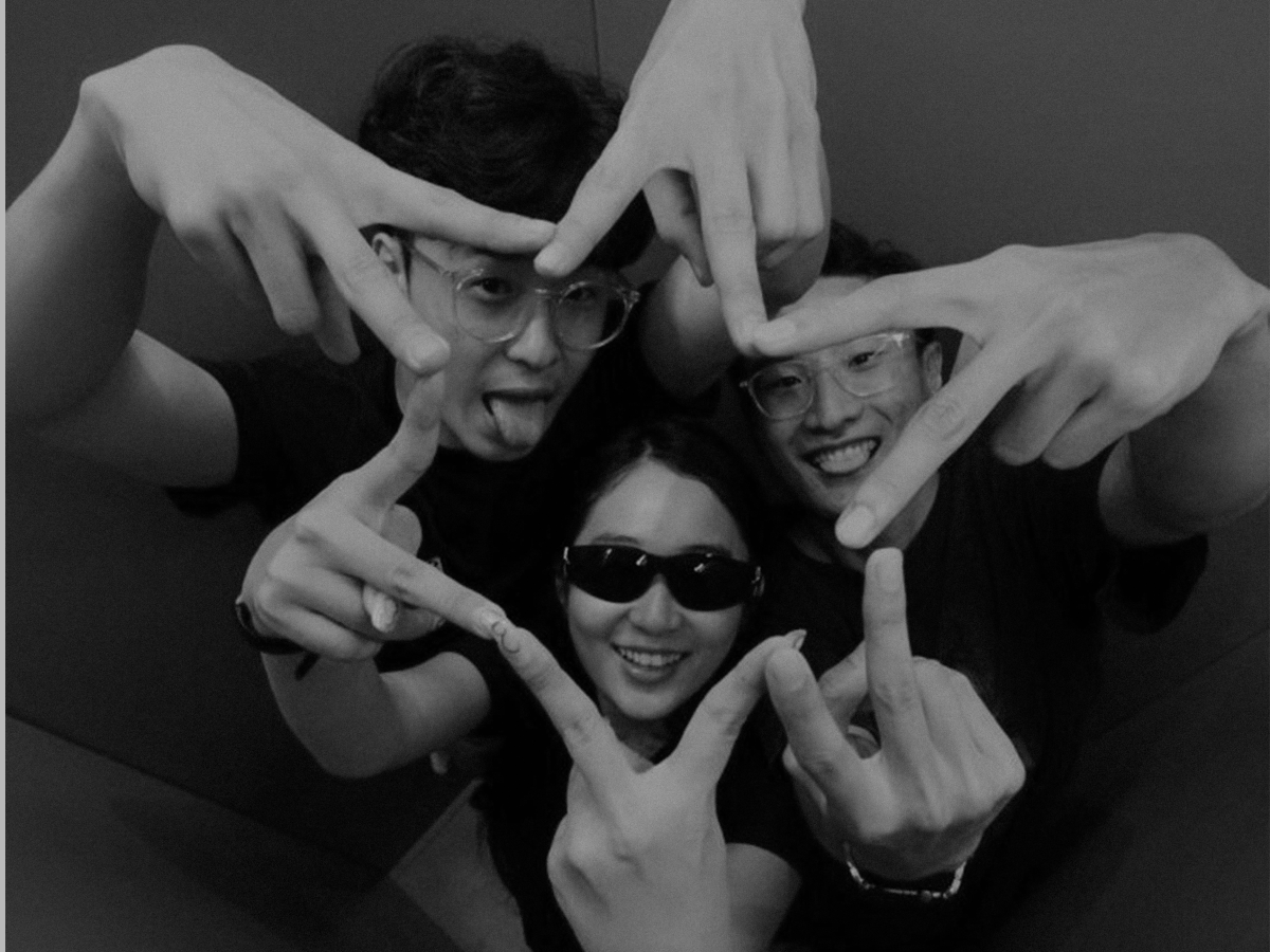 Small group of friends posing for a dynamic editorial photo in our Sydney high-angle photobooth hire.