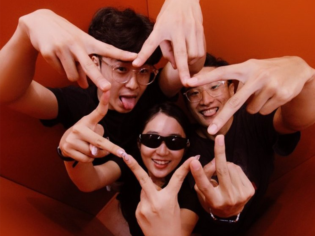 Small group of friends posing for a dynamic editorial photo in our Sydney high-angle photobooth hire.