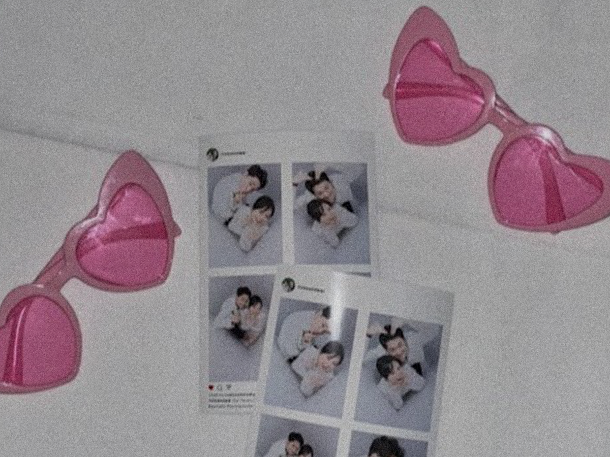 Custom wedding photo strip templates displaying dynamic prints from an overhead photobooth setup.
