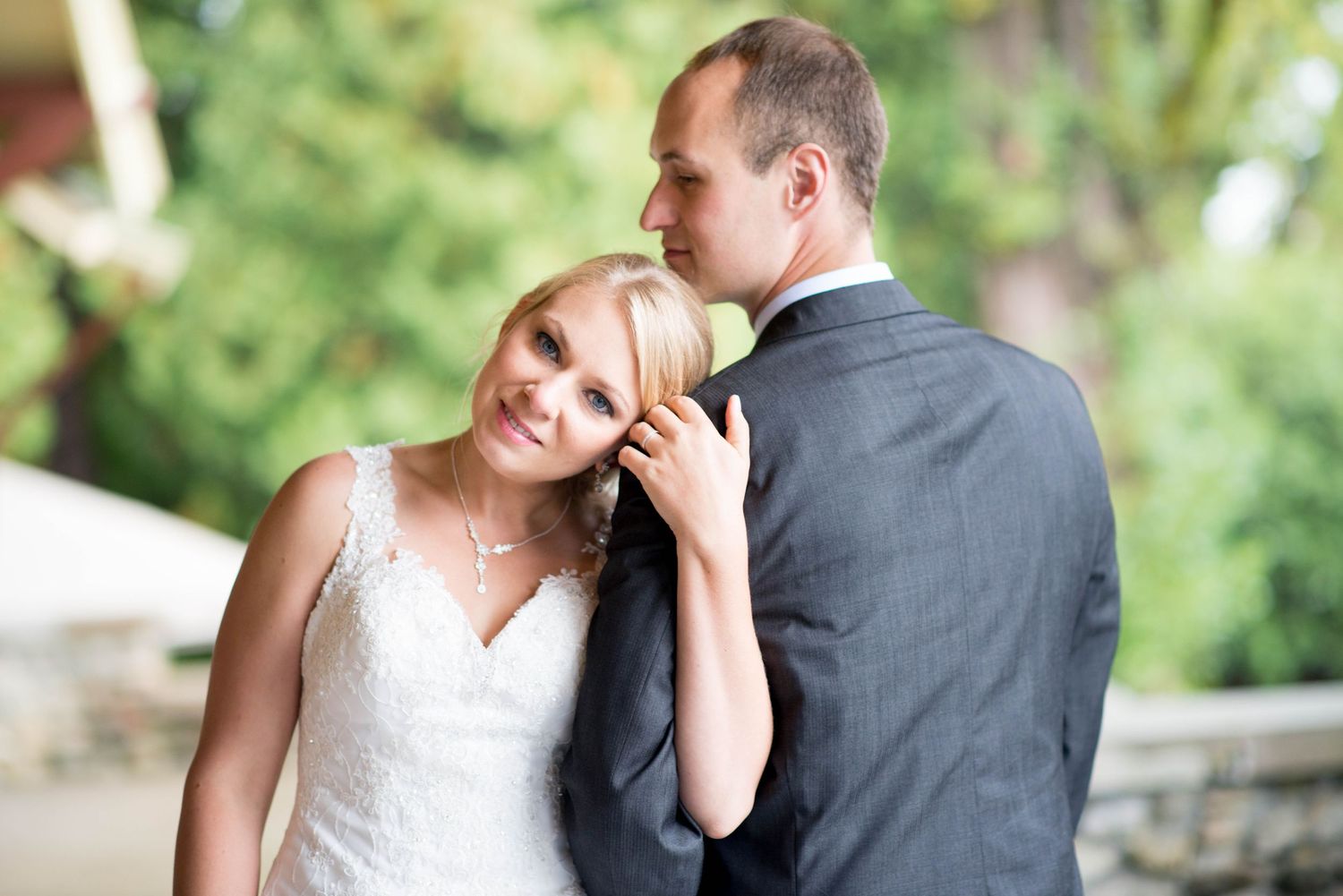 Bride and groom sharing a quiet moment during their wedding portraits in Burnaby, British Columbia.