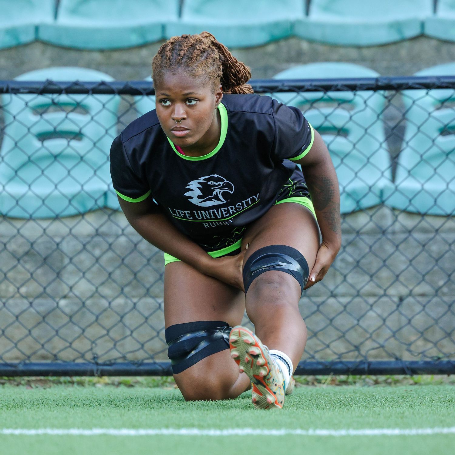 Women’s rugby sports photography in Atlanta capturing pre-match warmup and athlete performance environment