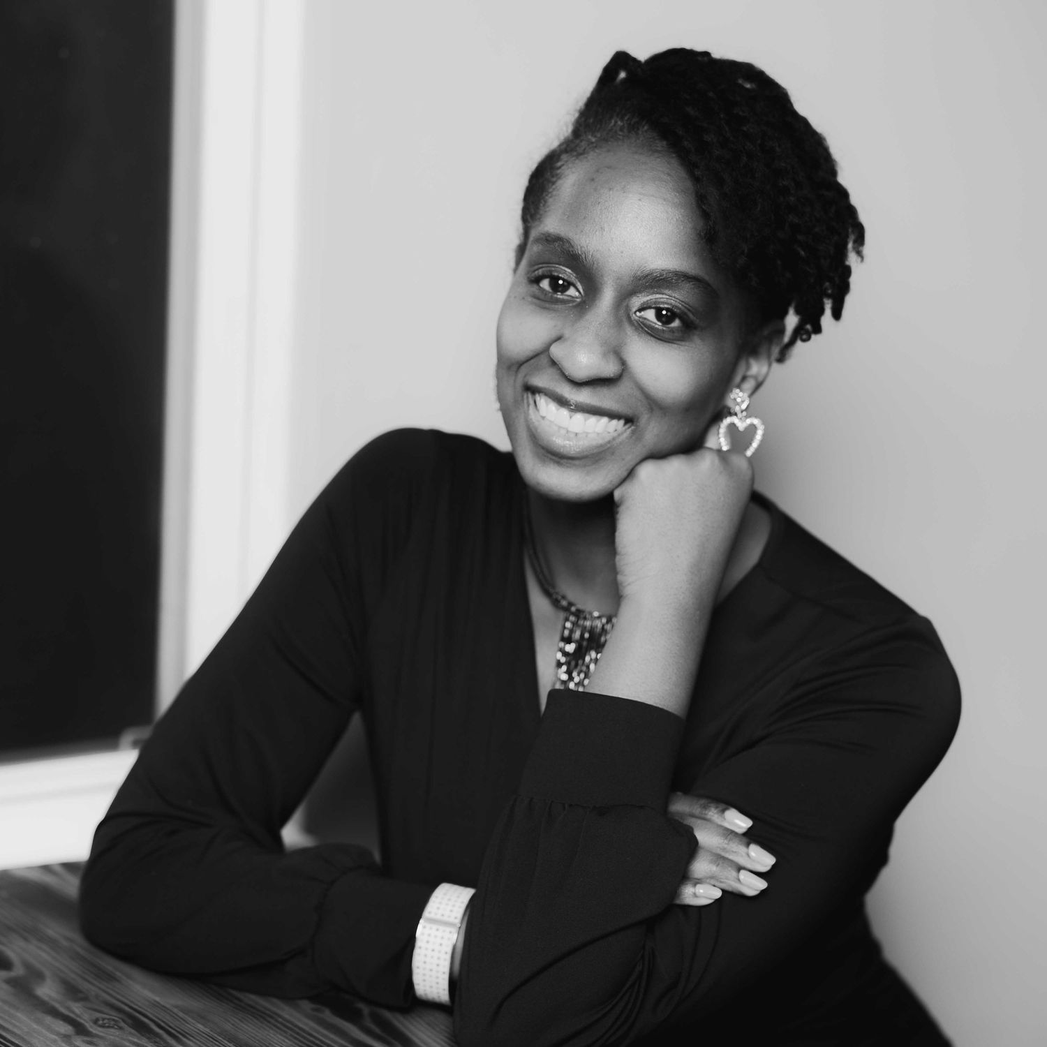 Personal branding portrait in black and white capturing confident expression and professional identity for media and brand use