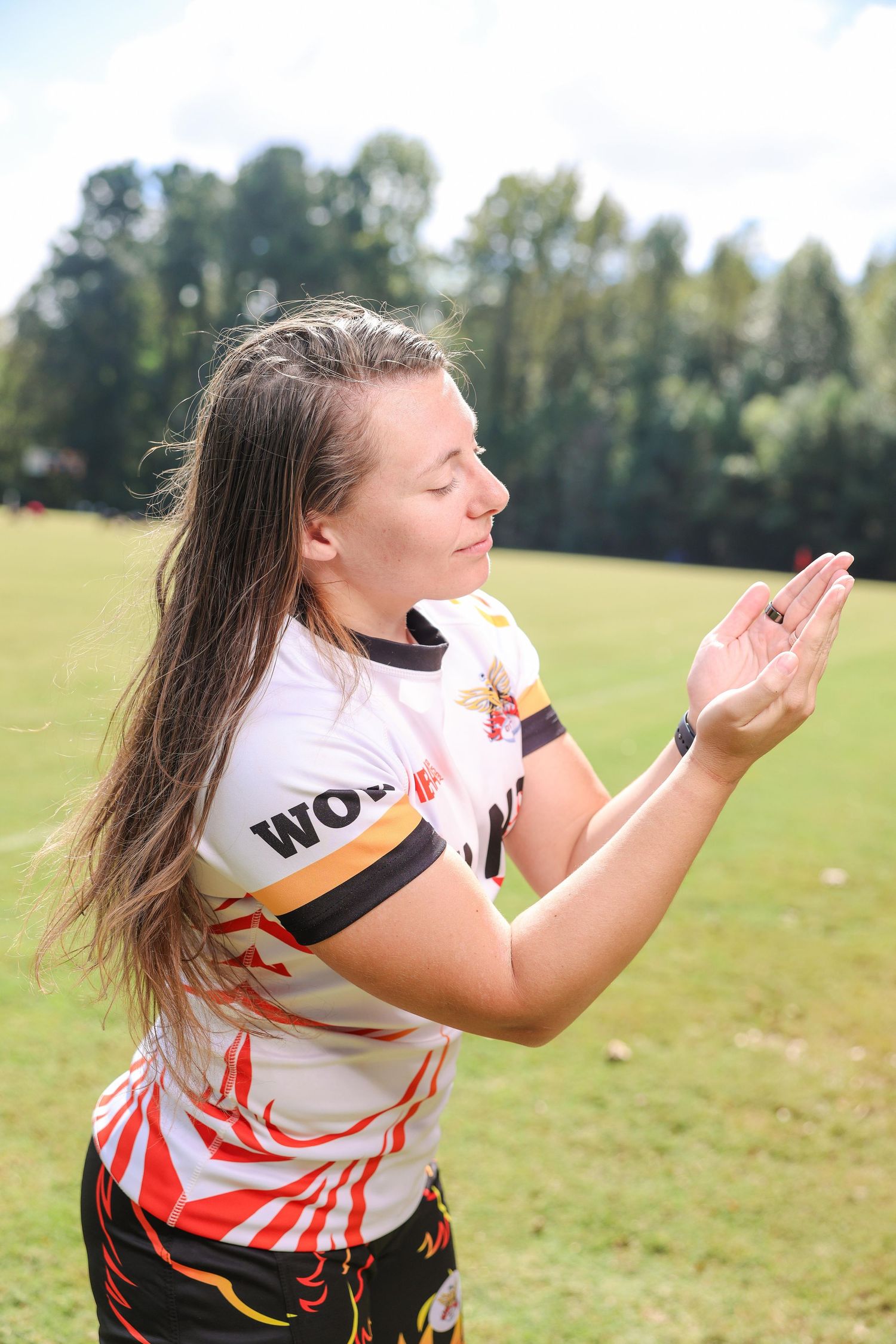 Athlete branding portrait in Atlanta capturing playful pose and personality for personal brand and sports media content