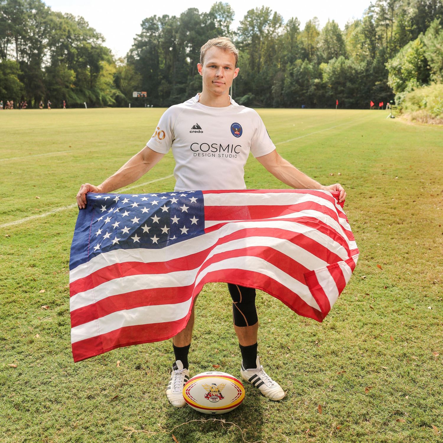 Athlete branding photography featuring rugby player with American flag for identity, storytelling, and sports media content