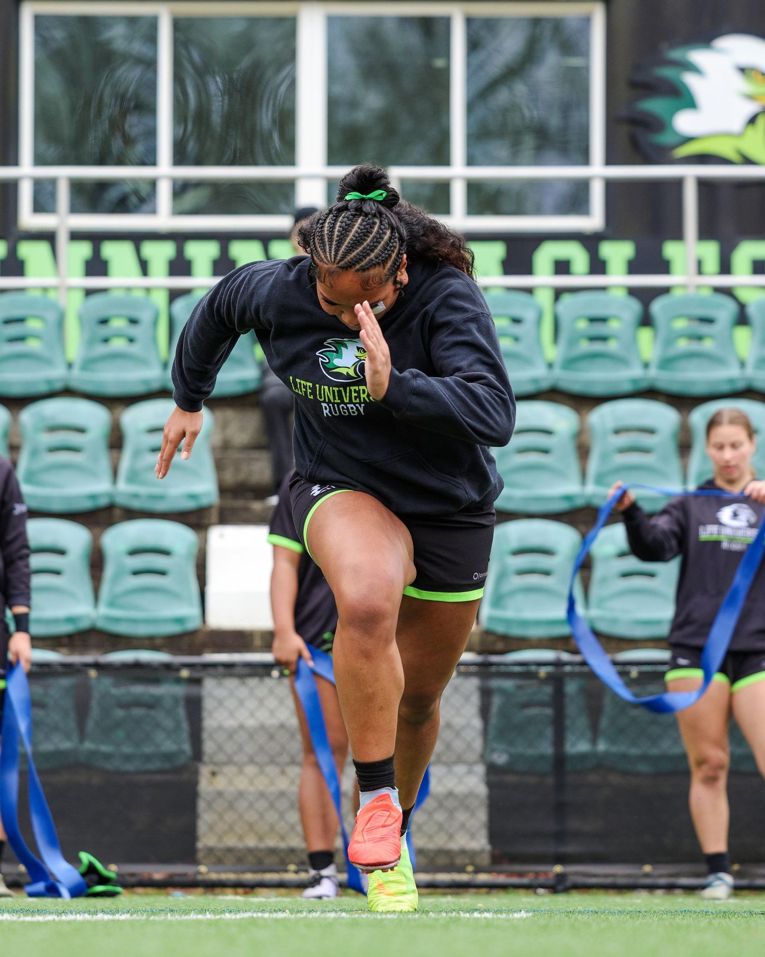 Rugby sports photography in Atlanta capturing warmup and mobility drills for athlete training and performance preparation