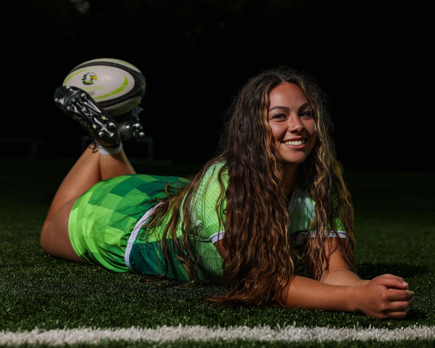 Athlete branding photography with dramatic lighting for sports media, personal branding, and athlete marketing content
